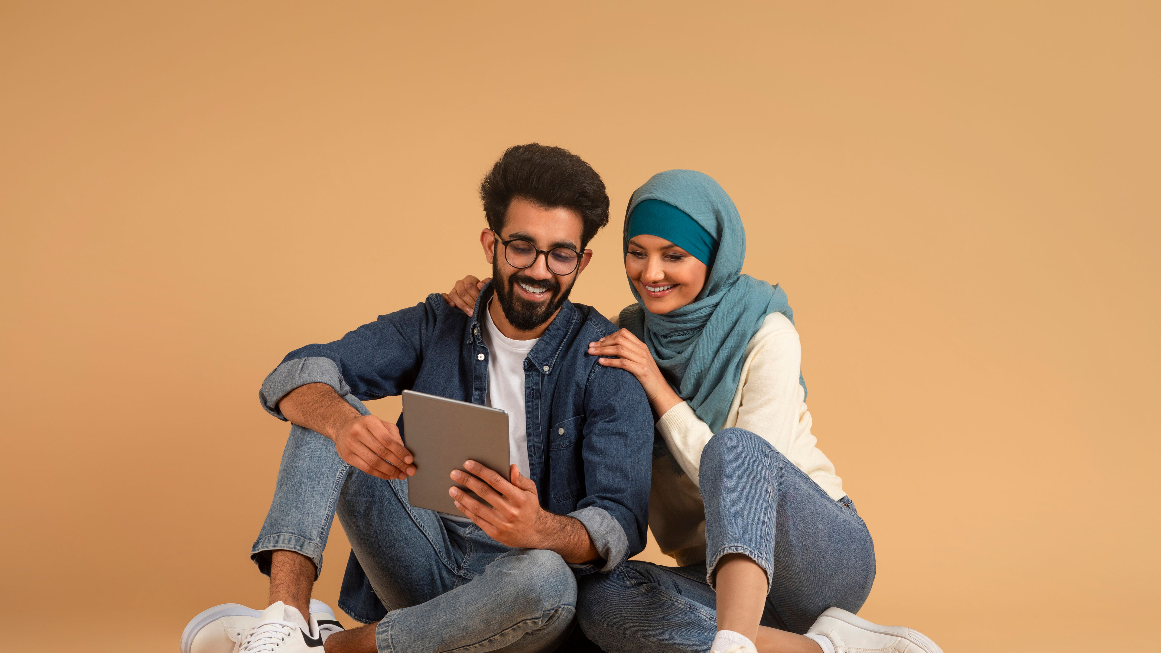 Arab Couple With Digital Tablet