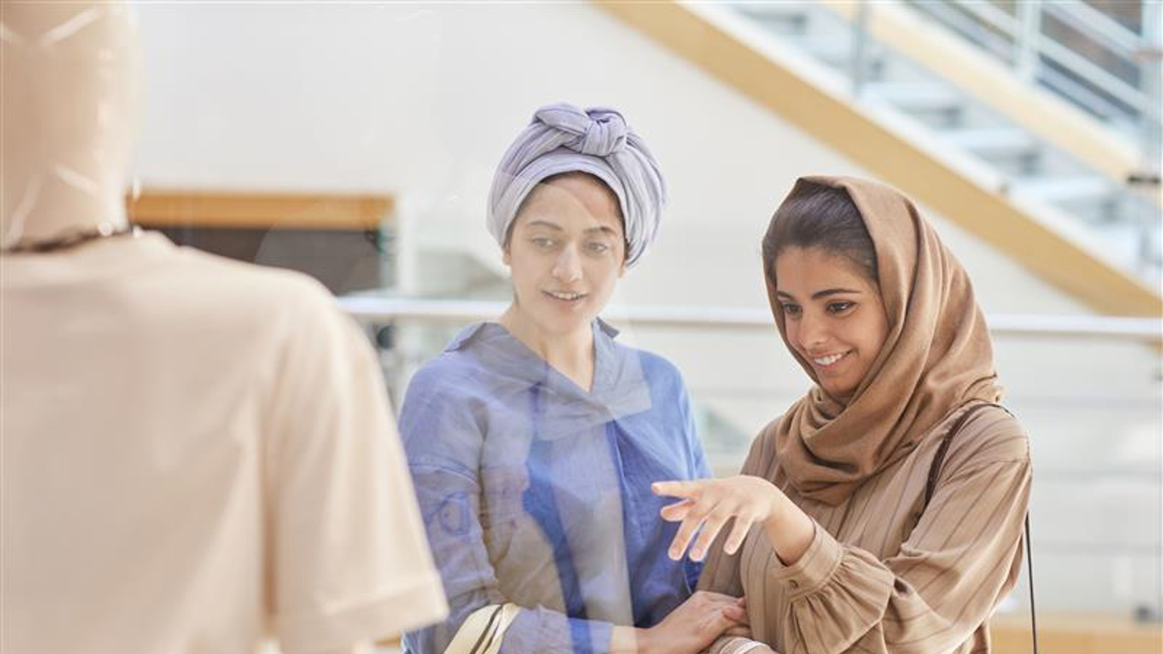 Arab girls in fashion store