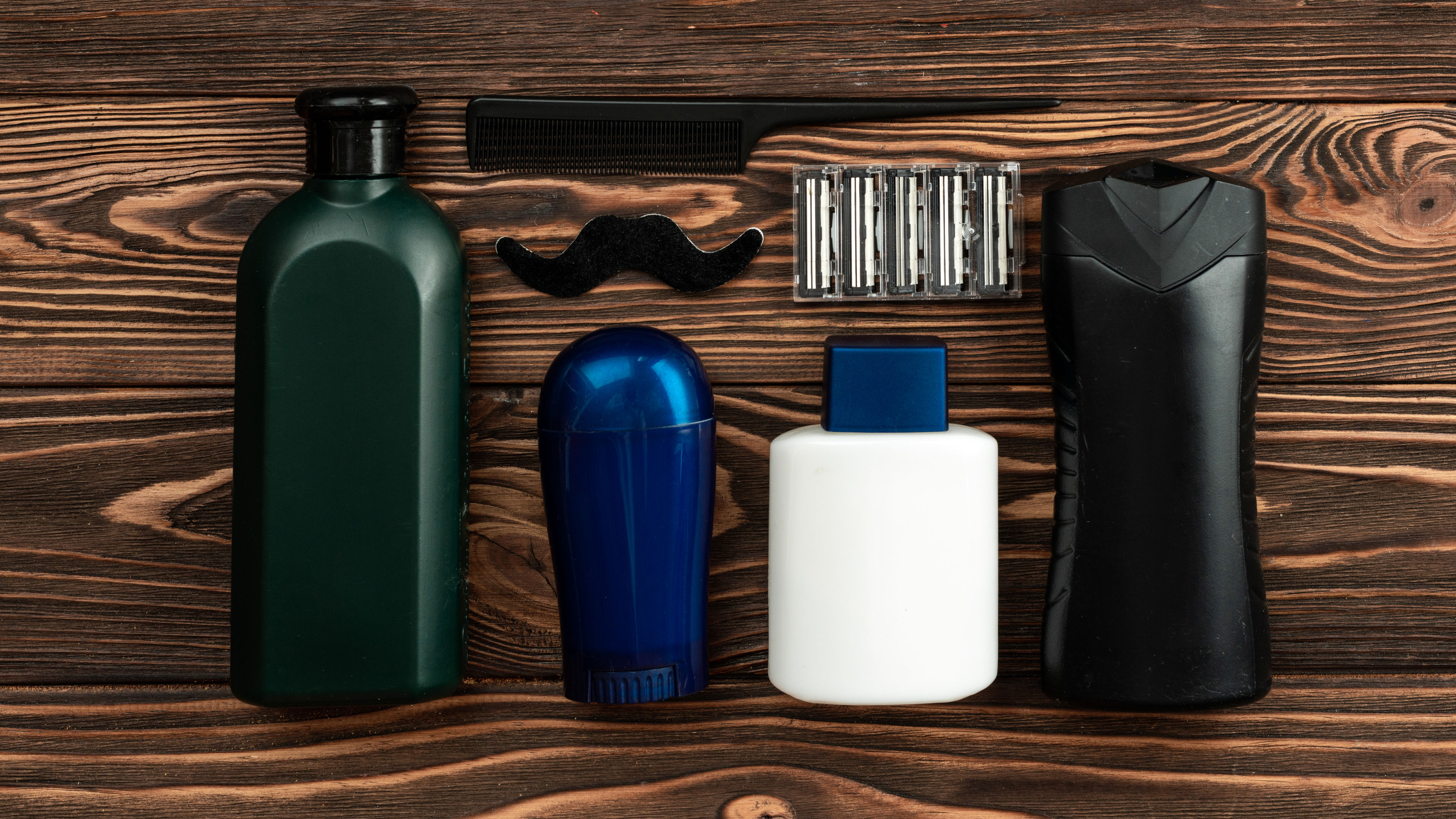 Barber shop tools on old wooden background