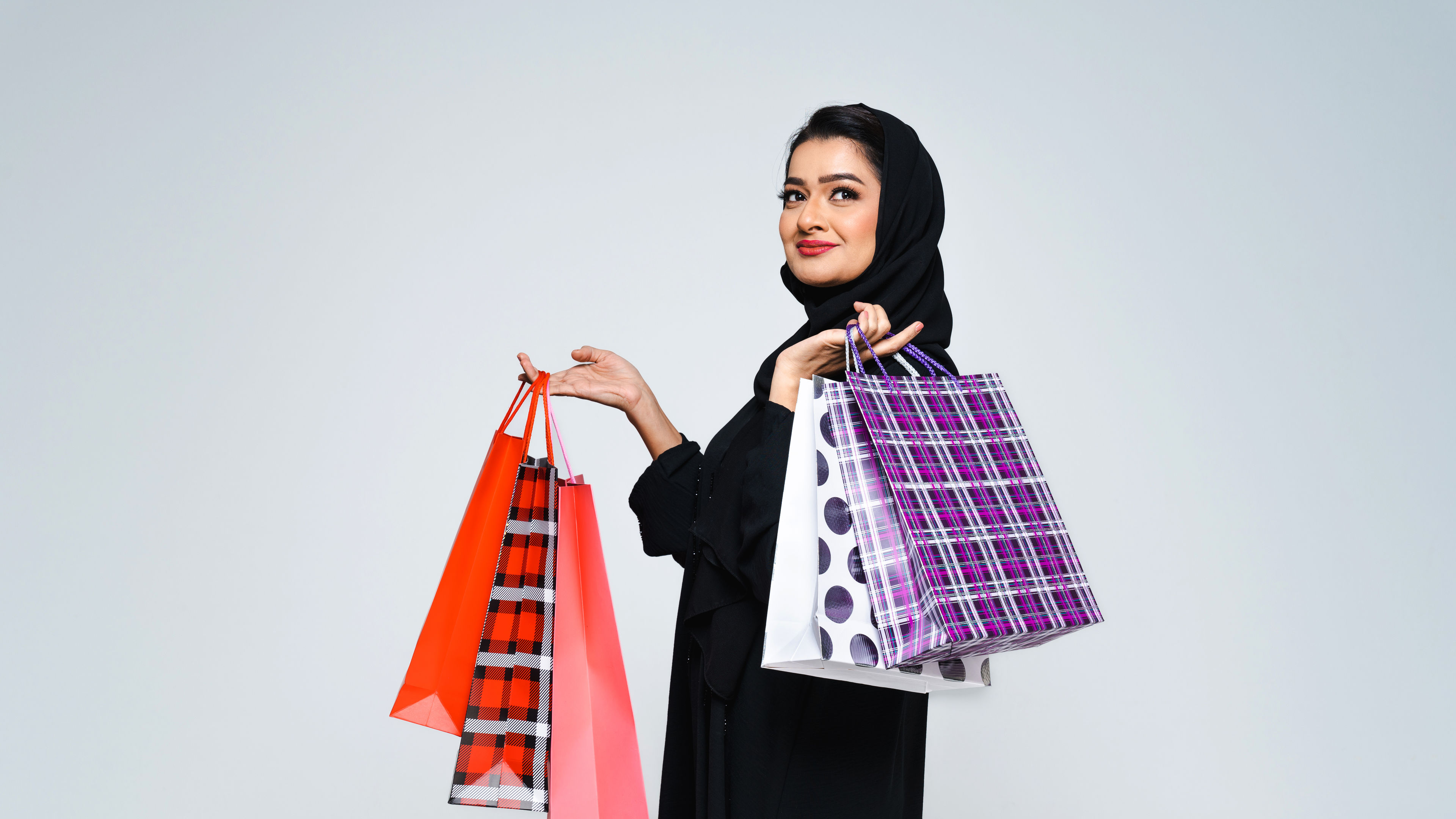 Beautiful arab middle-eastern woman with traditional abaya dress