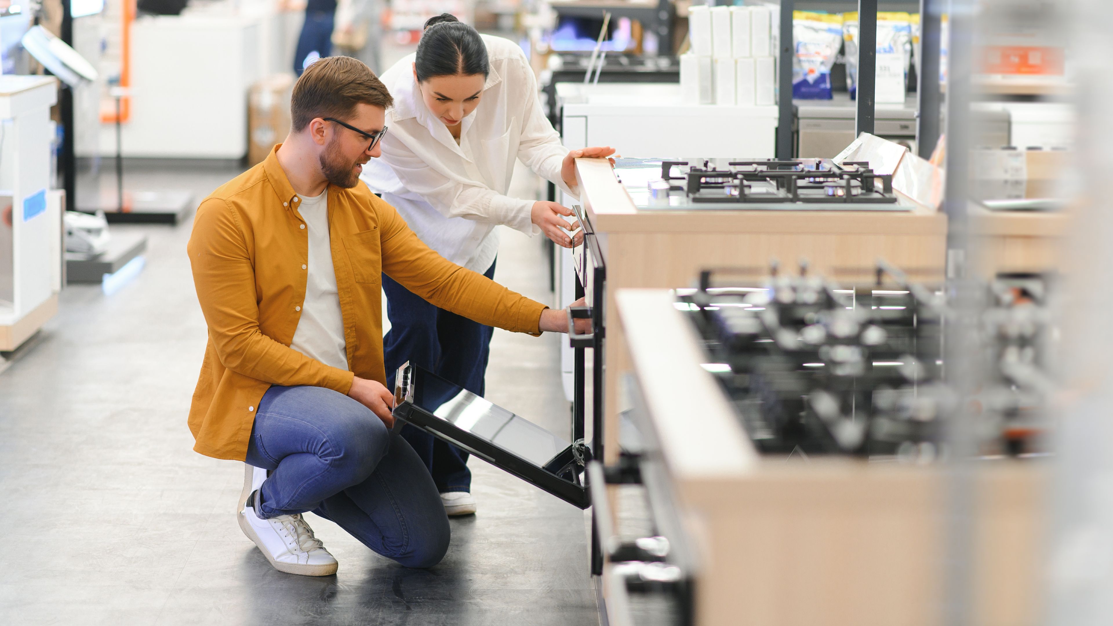 Couple buying new gas stove