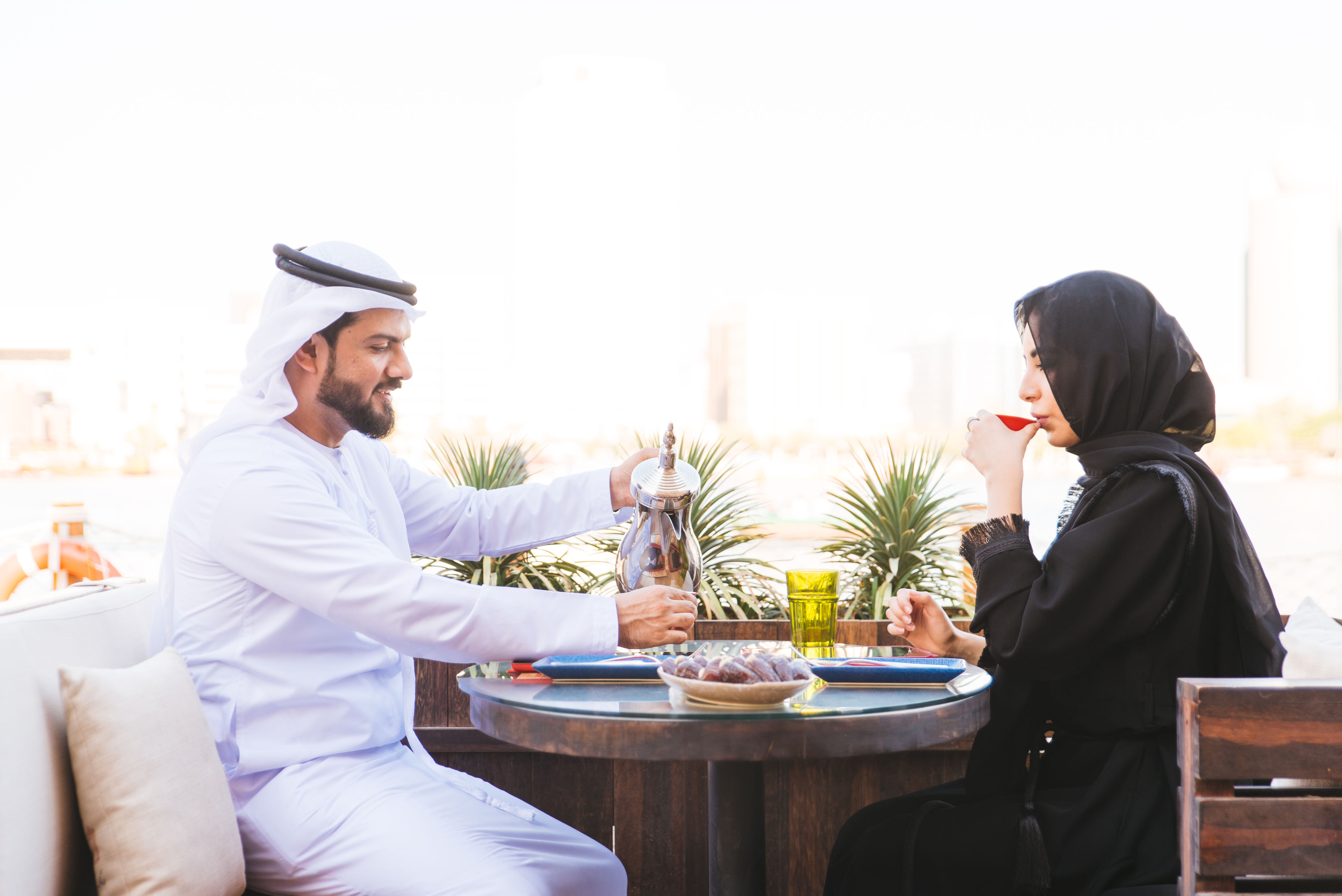 Couple enjoying a coffee date outdoors 