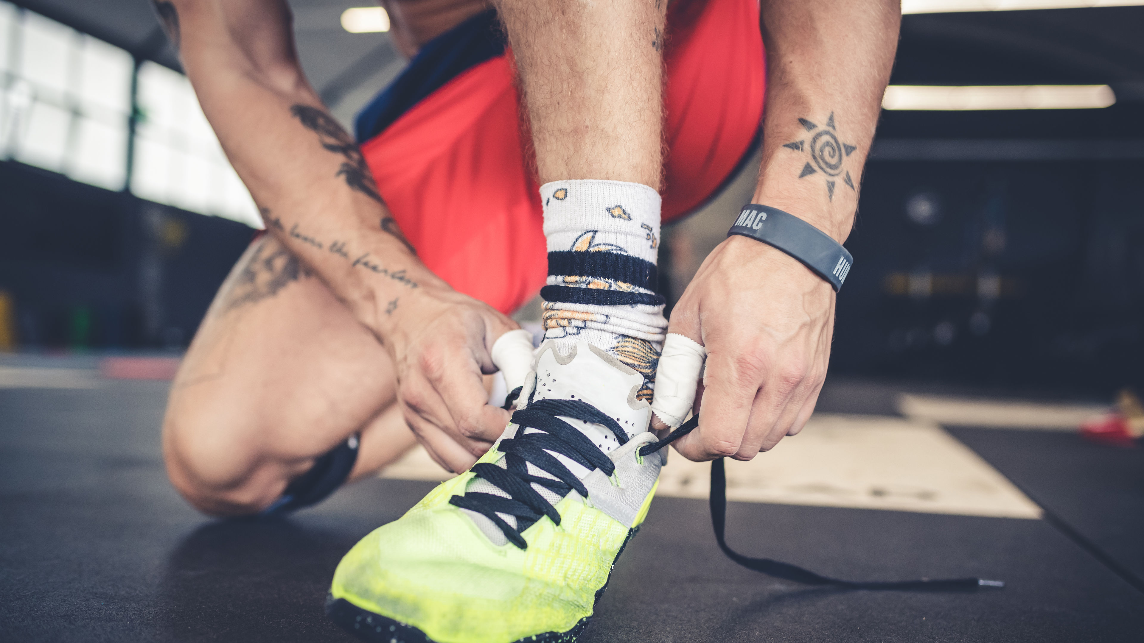 Man tying shoes