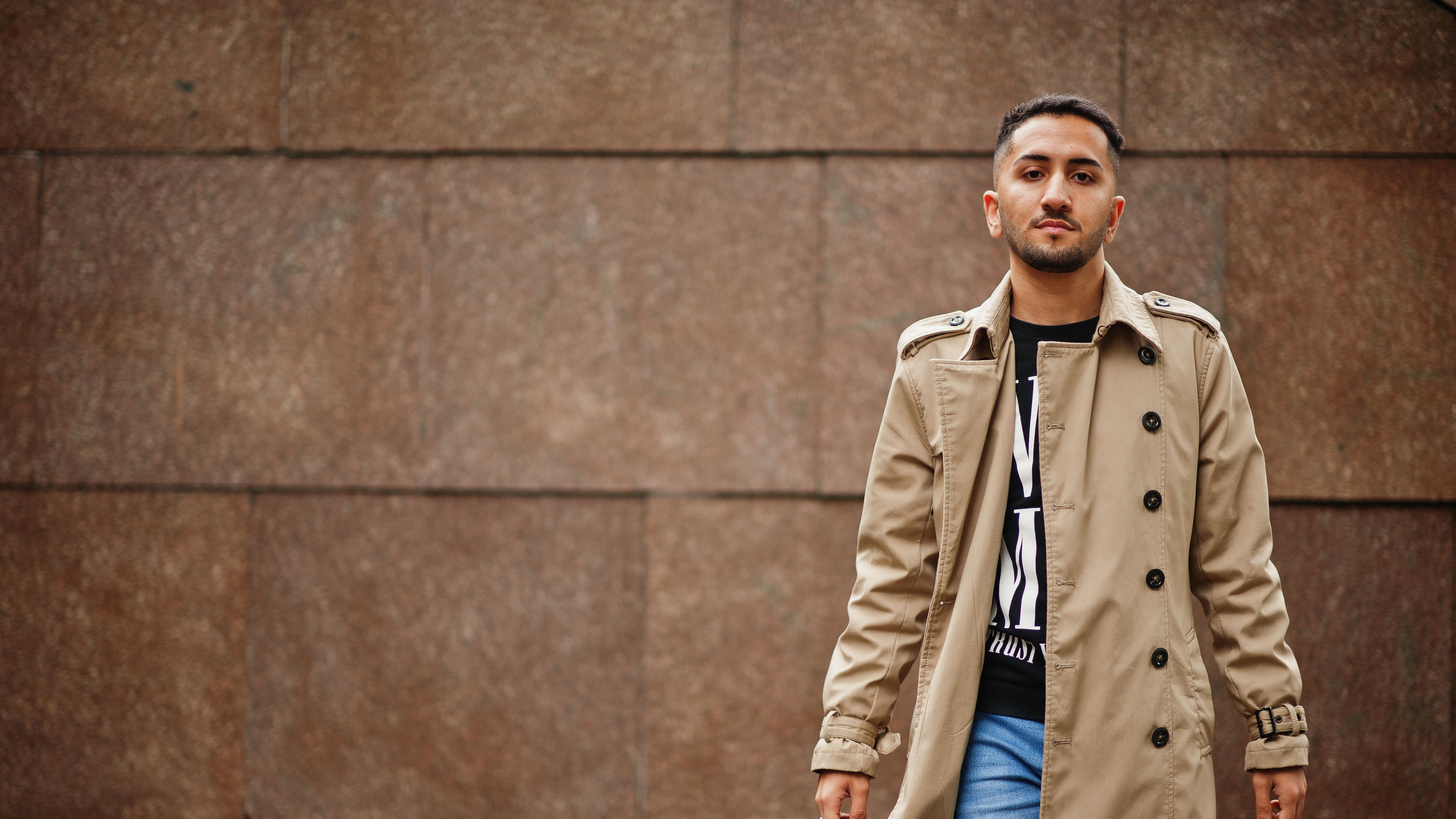 Stylish man at trench coat.