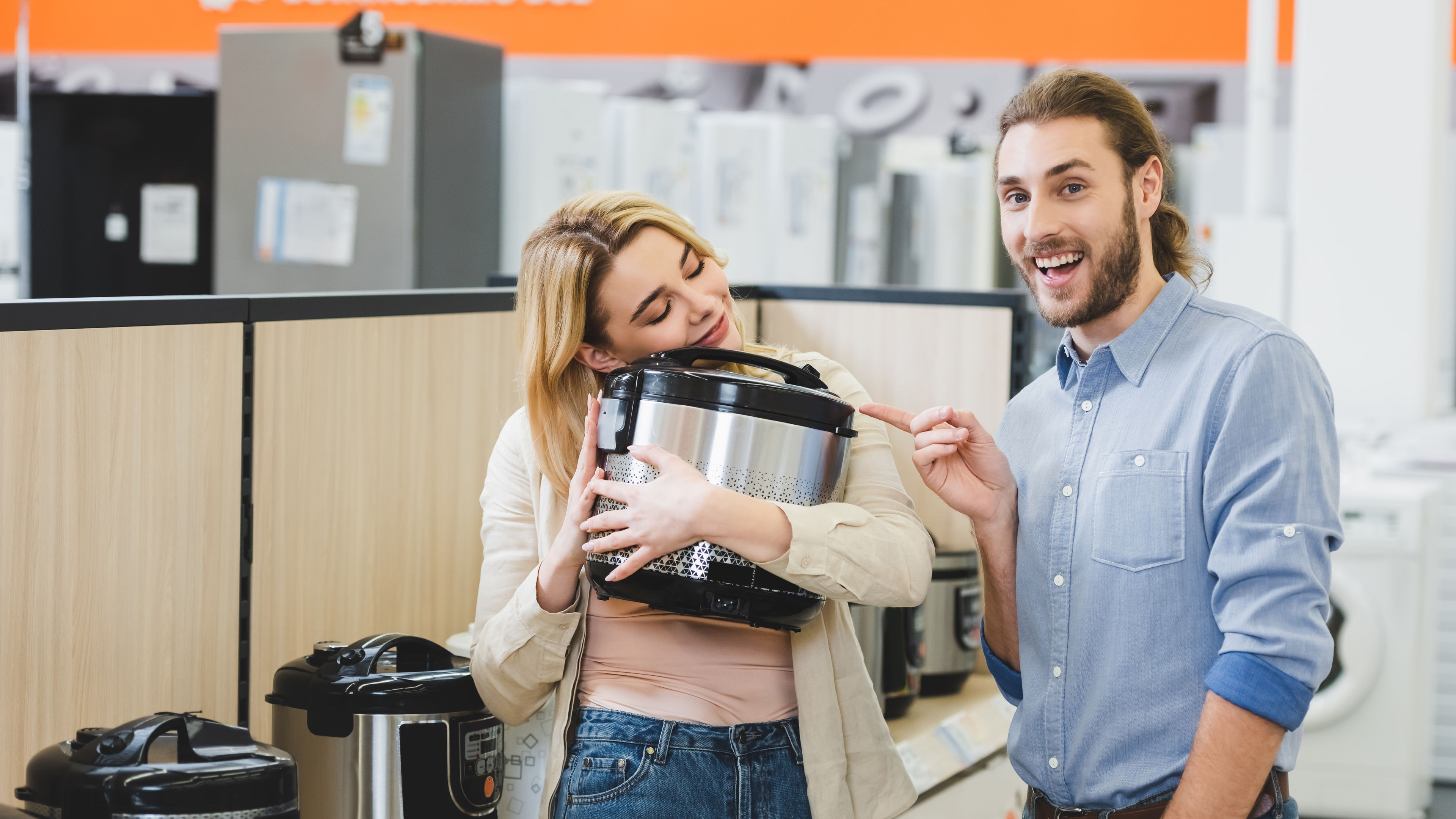 Woman holding slow cooker
