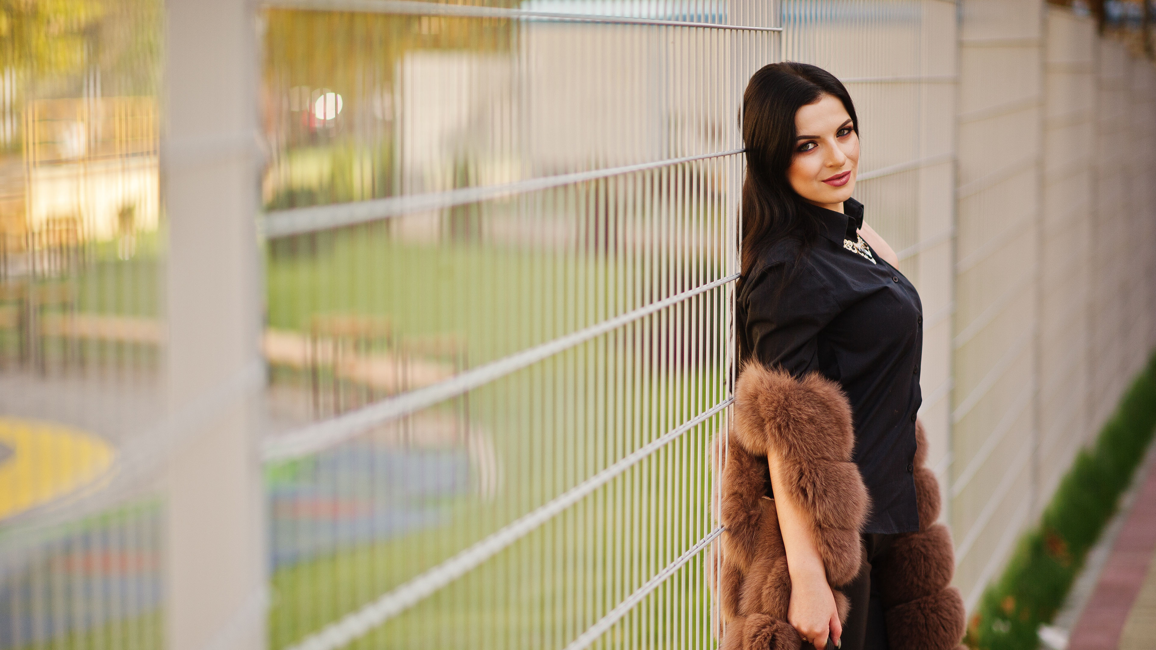 Woman posing outside