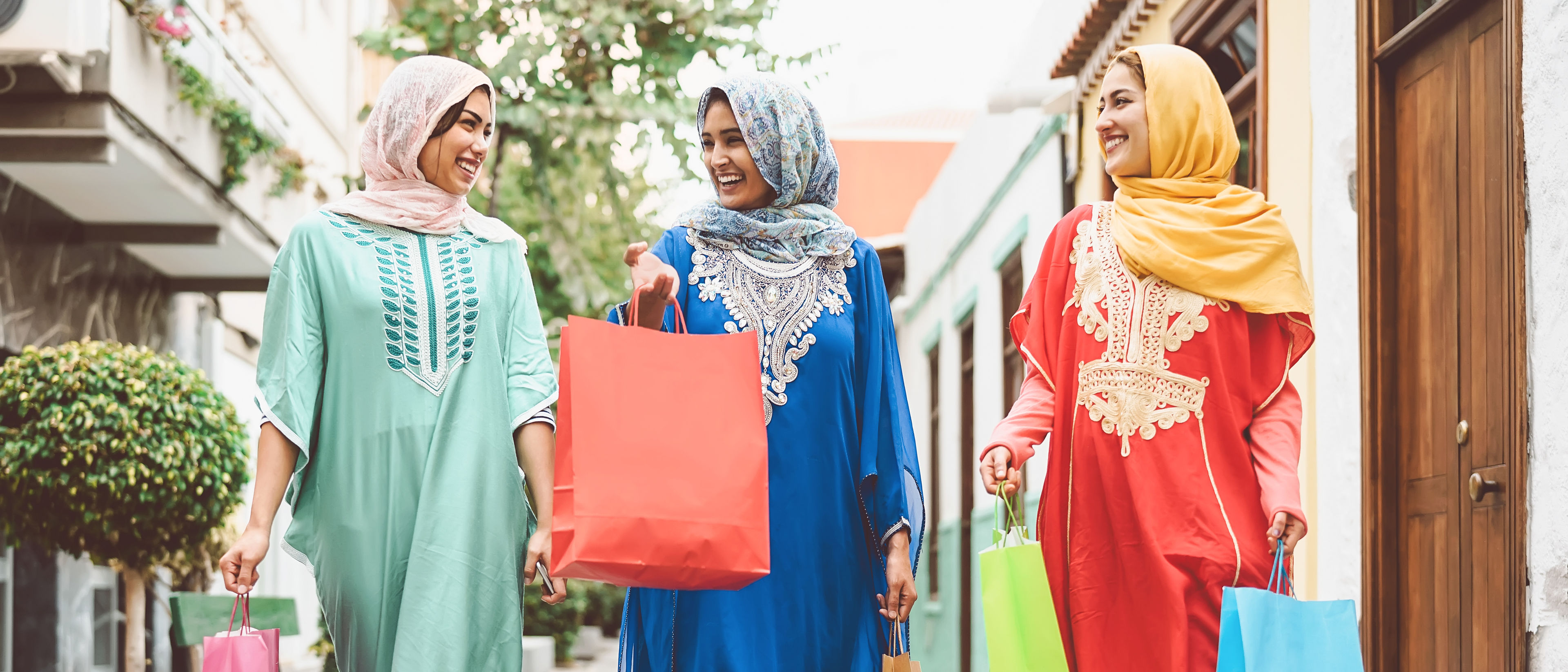 Happy womens with shopping bag